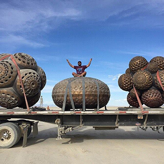 Bronze sculptures by MARS-1 on the delivery truck at Burning Man 2015